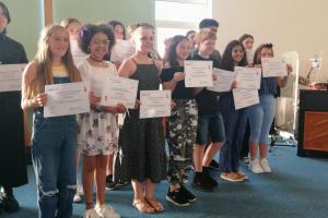 Competitors with their certificates
